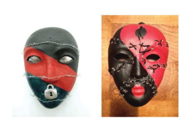 A pair of black and red masks, one with barbed wire around it and a lock on its mouth, and the other with stitches all across it.