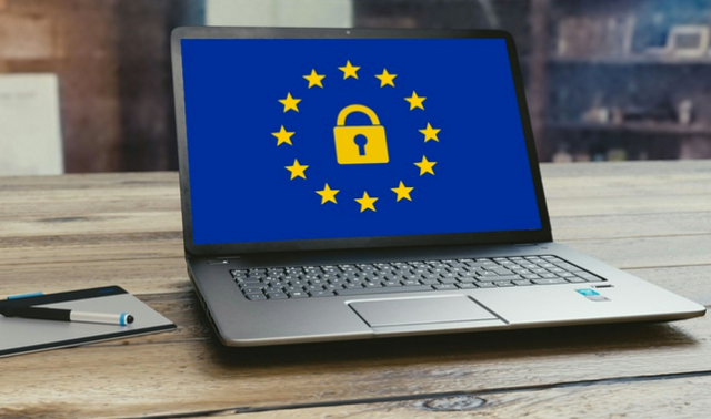 photo of laptop with a variation of the European Union flag and a lock